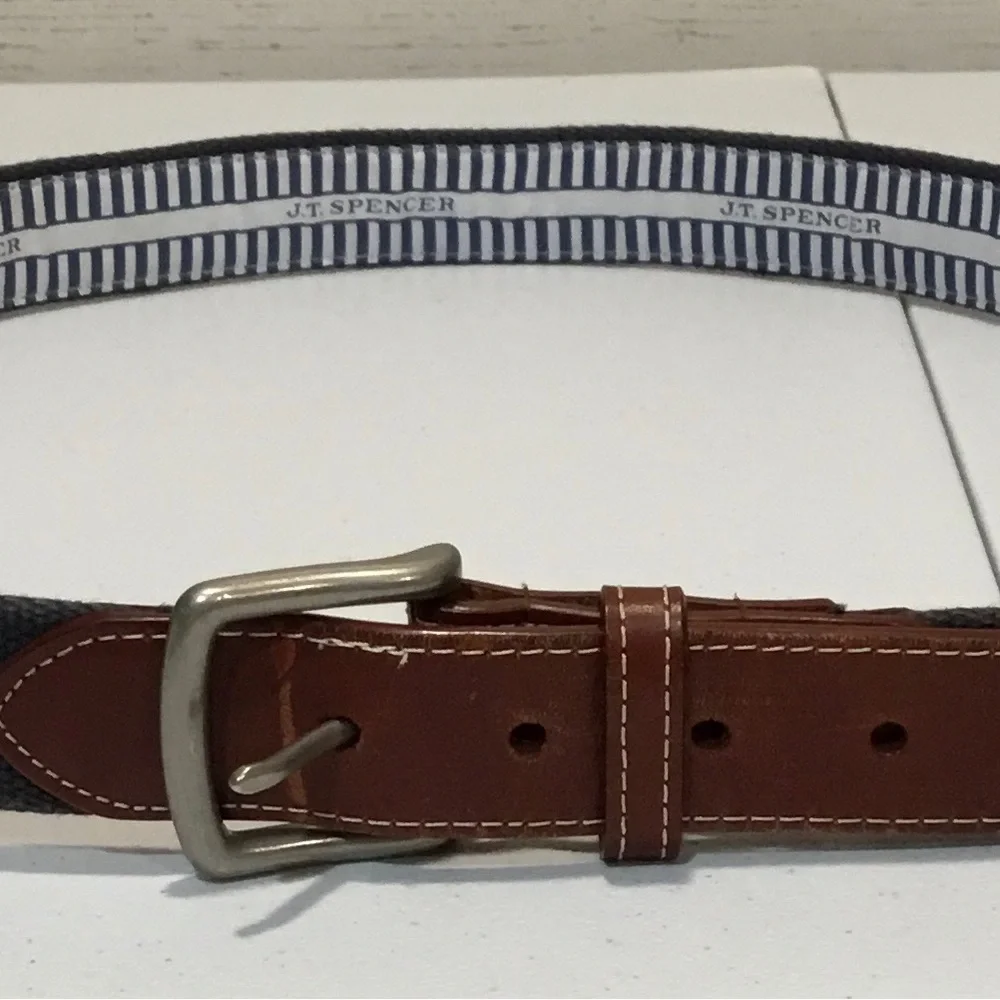 Men's Grey Woven Belt  with Golf Clubs and has Brown Leather Trim